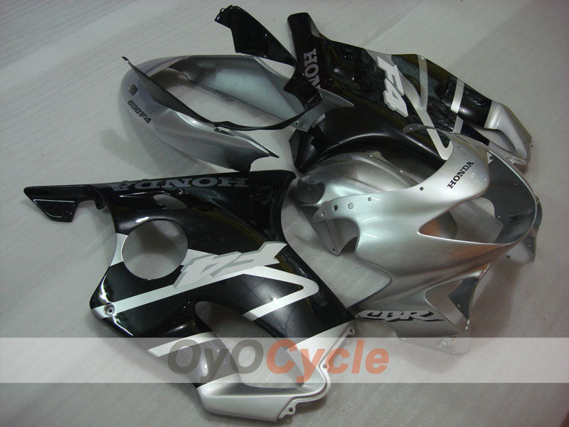 Kit de carénage à injection pour CBR600F4 99-00 - Noir, argenté - Style d'origine #OYO87900121